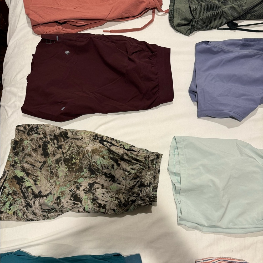 Whole lot of lulu lemon mens shorts and one j crew swim trunks! Good deal!